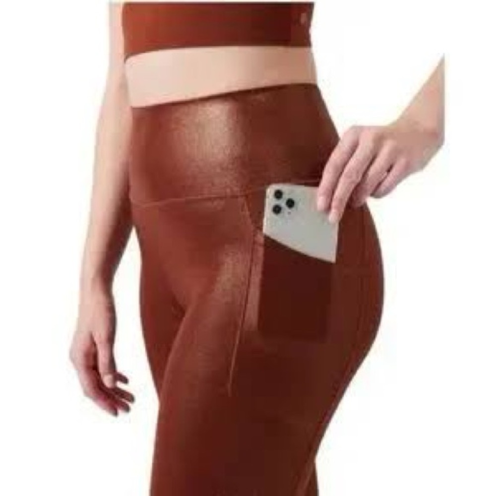 Athleta Salutation Shine Tight in Burnt Sienna/Copper Size Medium
